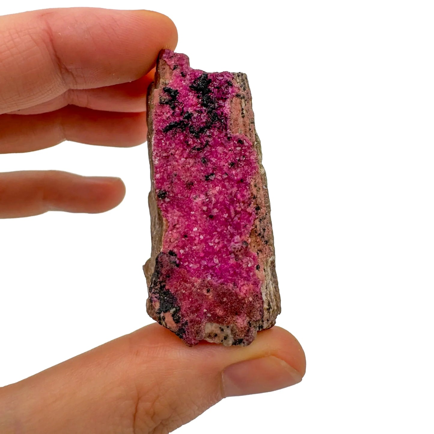 Size comparison with a Cobalt Calcite raw stone, from Democratic Republic of the Congo.