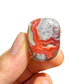 Profile shot of Crazy Lace Agate tumbled stone, from Chihuahua, Mexico.