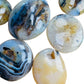 Top-side view of Dendritic Agate palm stone, hand-selected from Boeny, Madagascar, showing natural inclusions.