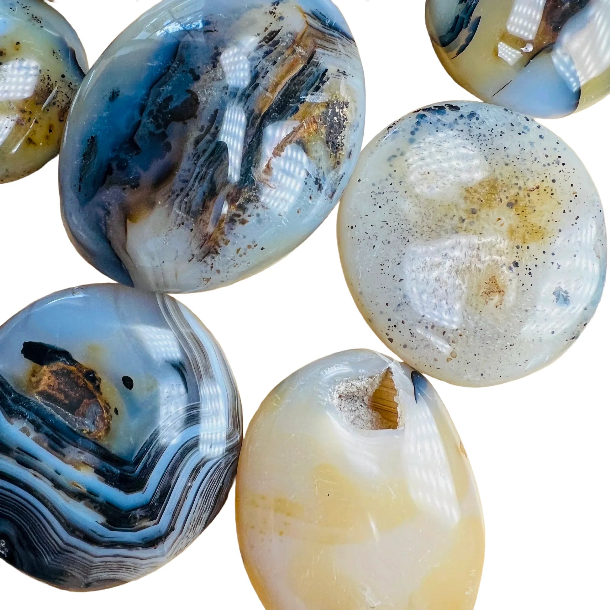 Top-side view of Dendritic Agate palm stone, hand-selected from Boeny, Madagascar, showing natural inclusions.
