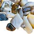 Plan view of Dendritic Agate tumbled stone, showing natural sheen, often kept for Grounding.