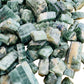 Opposite side of Grade A Diopside raw stone, often worked with for Healing and Love, sourced from Zambia.