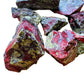 Macro view of Grade AA Dragon Bloodstone raw stone, kept near for Confidence and Energy.