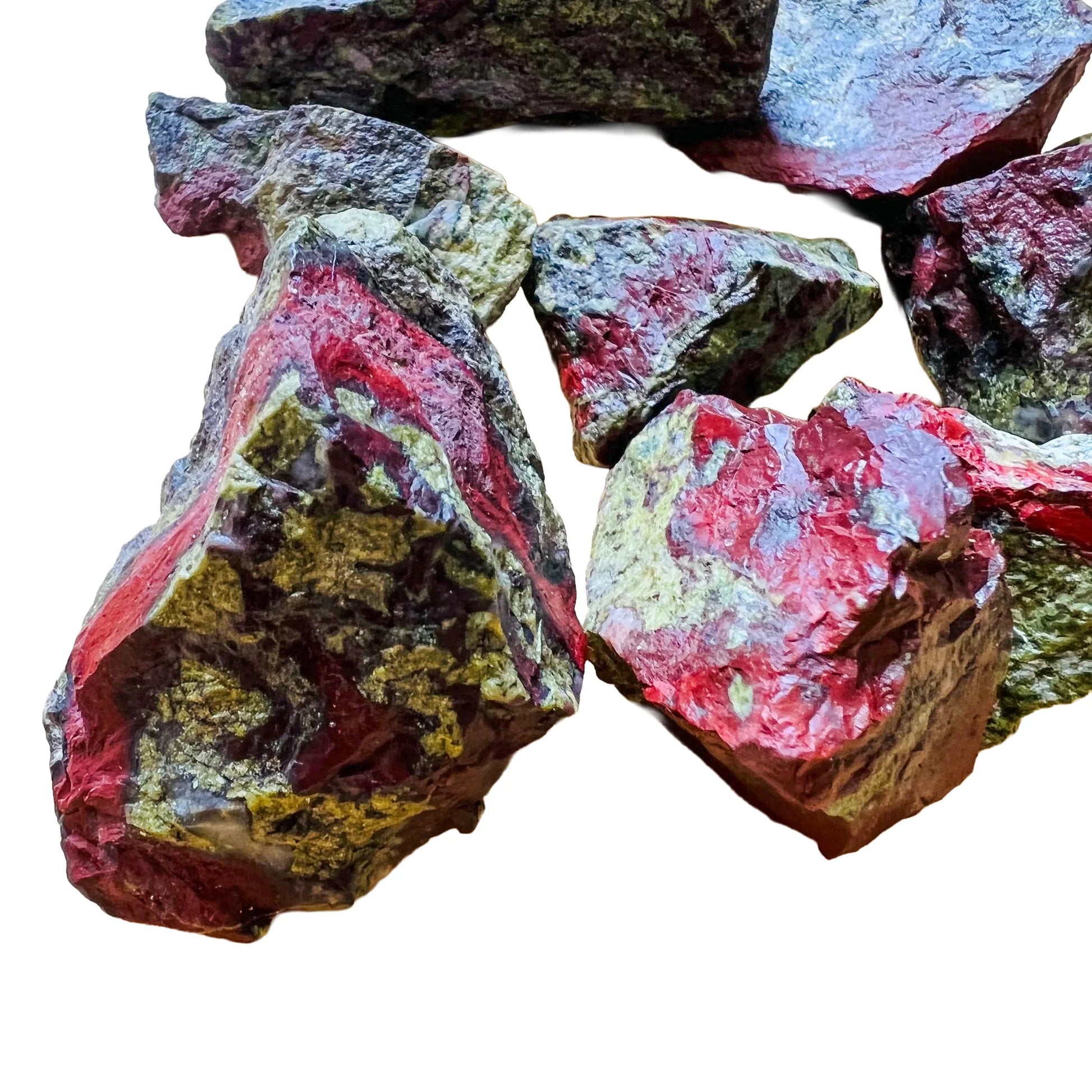 Macro view of Grade AA Dragon Bloodstone raw stone, kept near for Confidence and Energy.