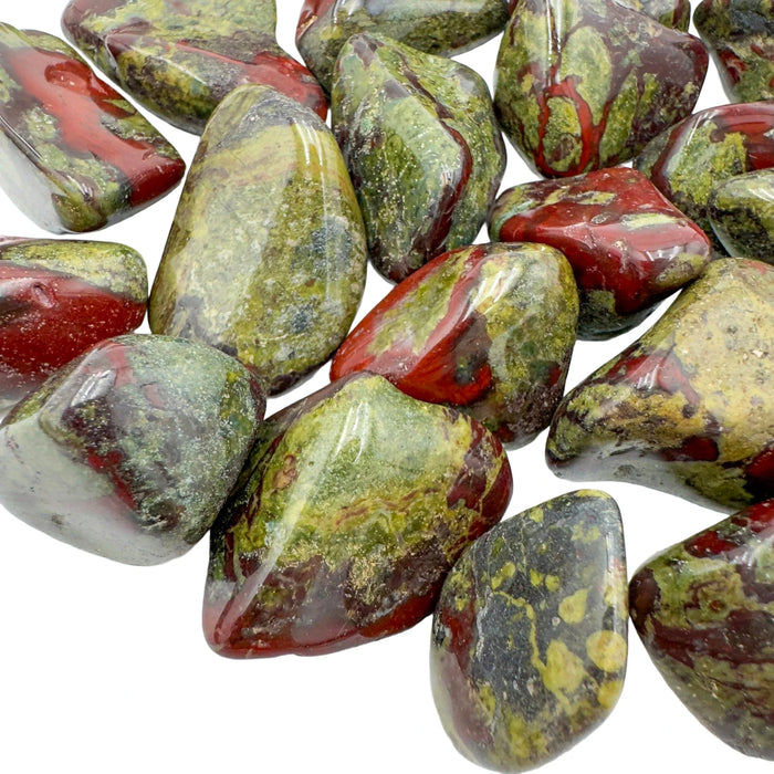 Profile shot of Grade AA Dragon Bloodstone tumbled stone, showing natural variation.