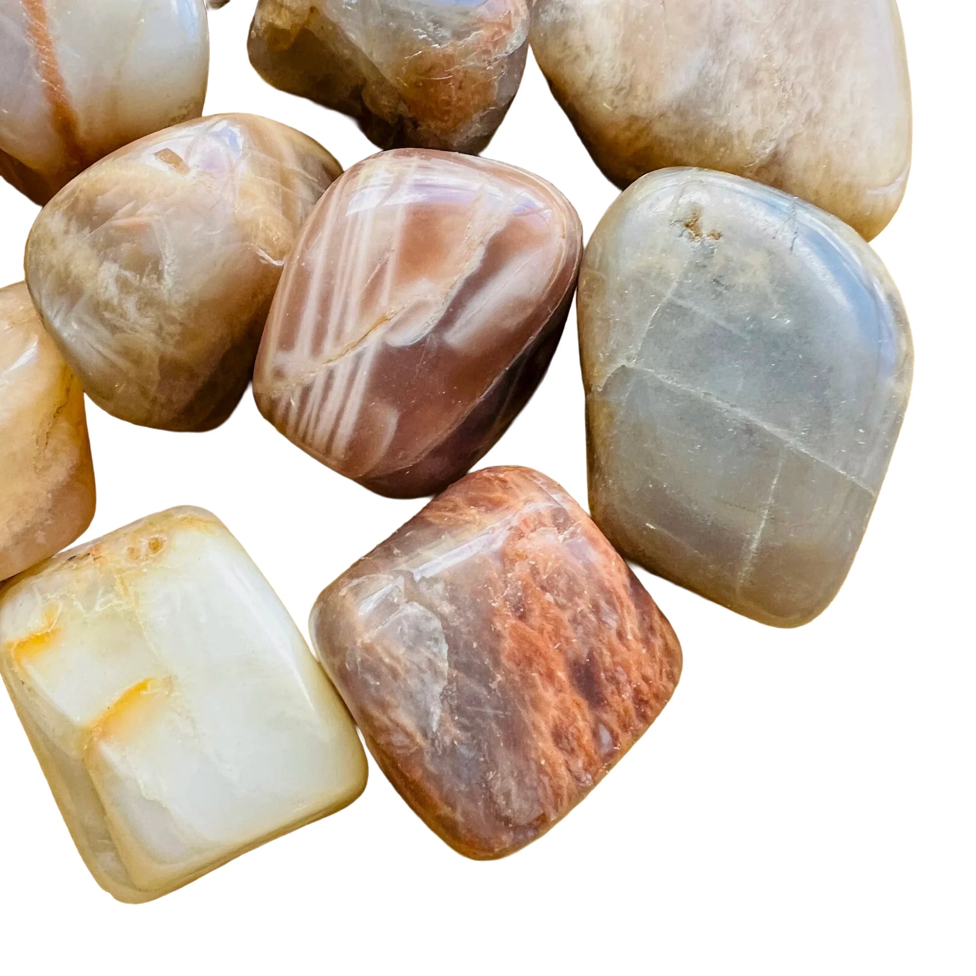 Detail shot showing brown Earth Moonstone tumbled stone, sourced from Brazil.