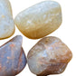 Bird's-eye view of brown Earth Moonstone tumbled stone, from Minas Gerais, Brazil, often kept for Grounding.