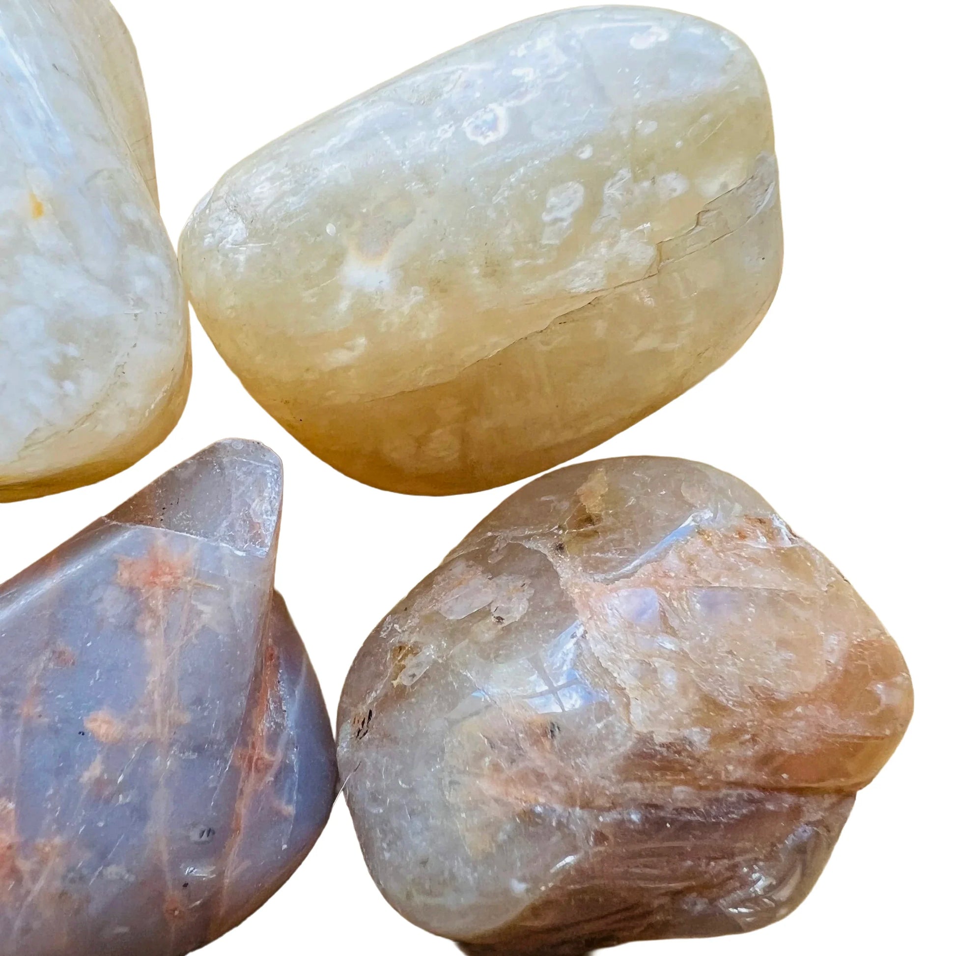 Bird's-eye view of brown Earth Moonstone tumbled stone, from Minas Gerais, Brazil, often kept for Grounding.