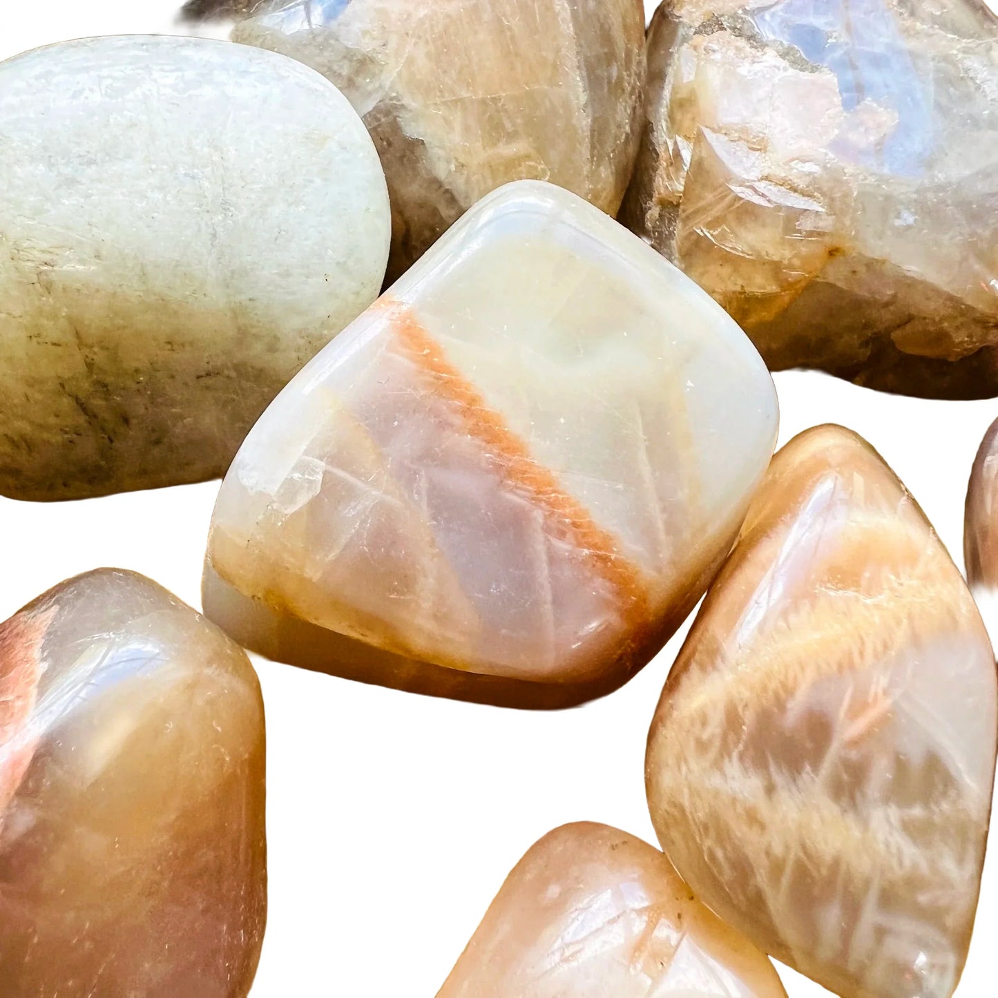 Bottom side of Earth Moonstone tumbled stone, from Minas Gerais, Brazil, often worked with for Grounding and Emotional Healing.