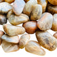 Macro view of Earth Moonstone tumbled stone, Brazil-sourced, showing characteristic finish.