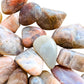 Field-of-view of Earth Moonstone tumbled stone, from Minas Gerais, Brazil, captured in natural daylight.