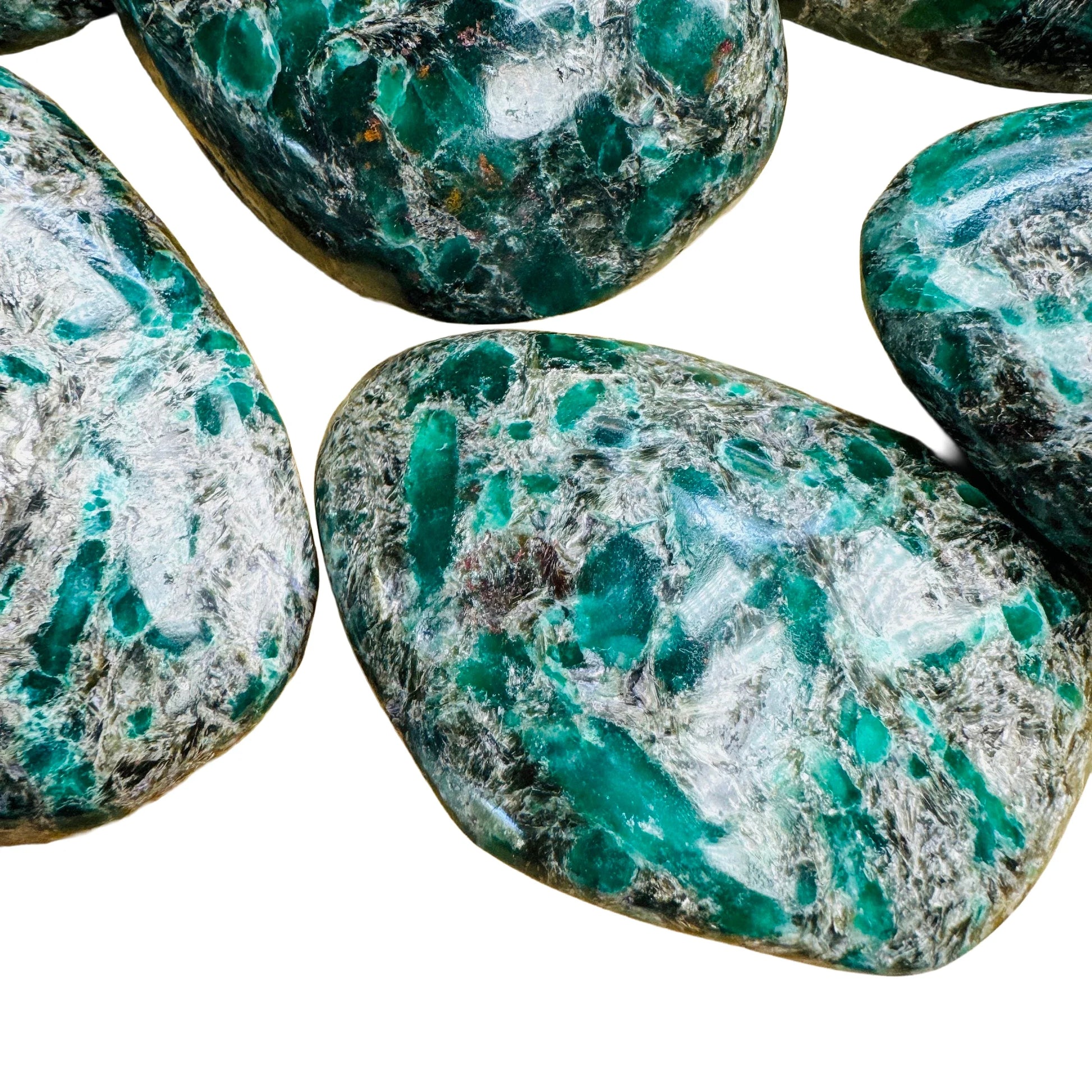 Side-on view of green Emerald palm stone, showing subtle veining.