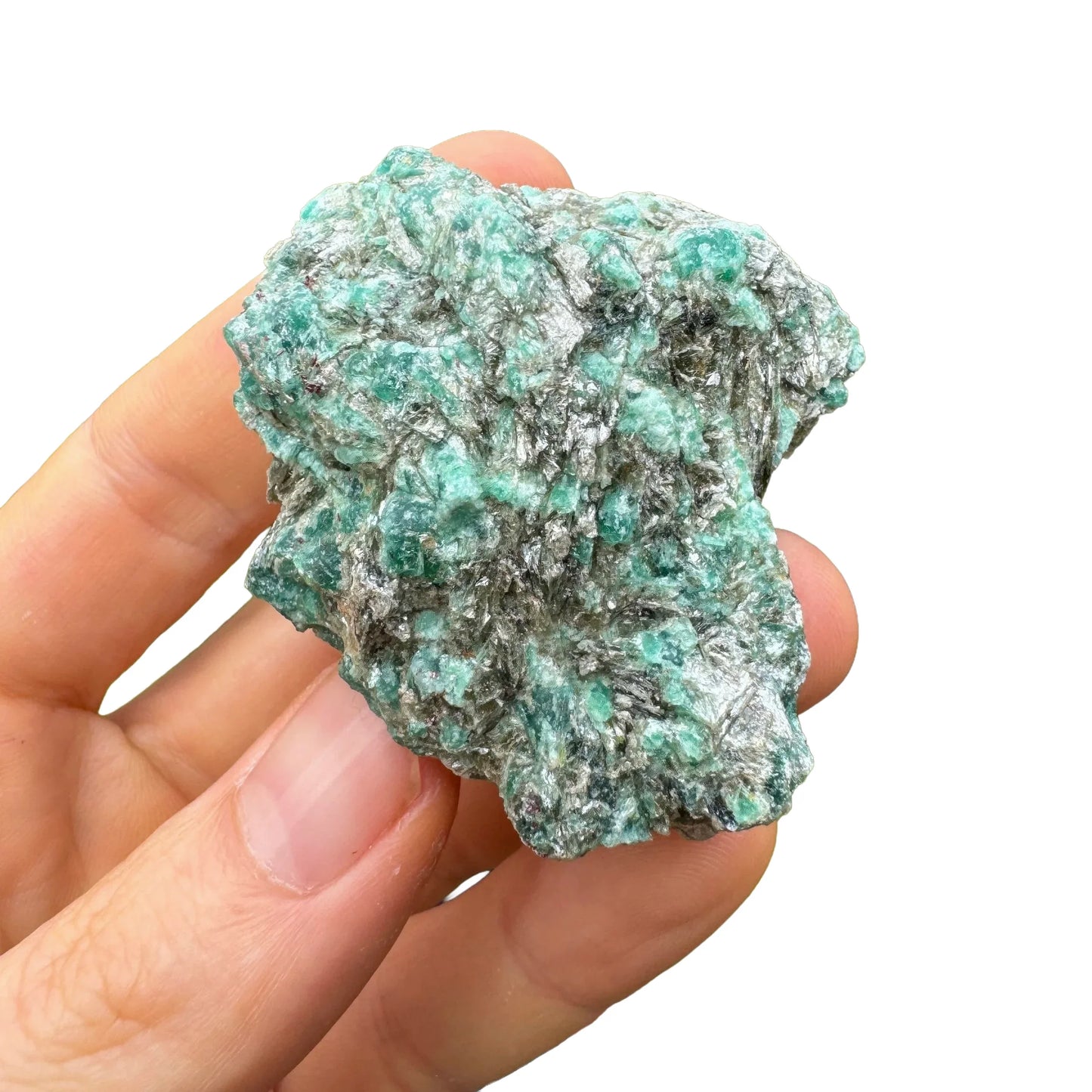 Top view of green Emerald specimen, showing natural patina.
