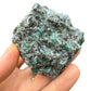 Rear view of Emerald specimen, often paired with practices around Love, showing raw matrix.