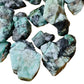 Color detail of green Emerald raw stone, sourced from Bahia, Brazil, showing characteristic finish.