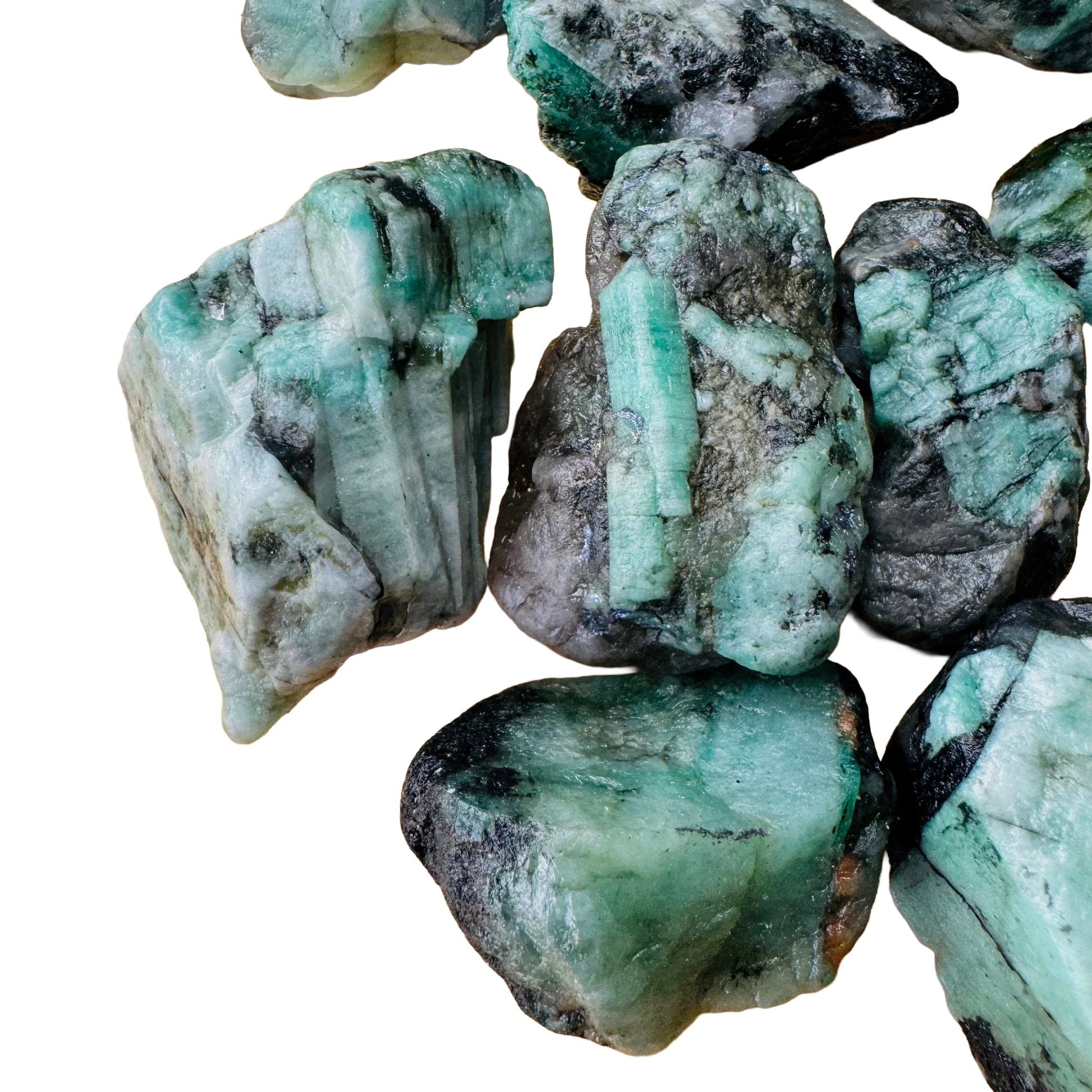 Edge-on view of green Emerald raw stone, Brazil-sourced, often paired with practices around Love.