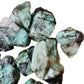 Underside view of Grade AA Emerald raw stone, kept close for Love, sourced from Brazil.