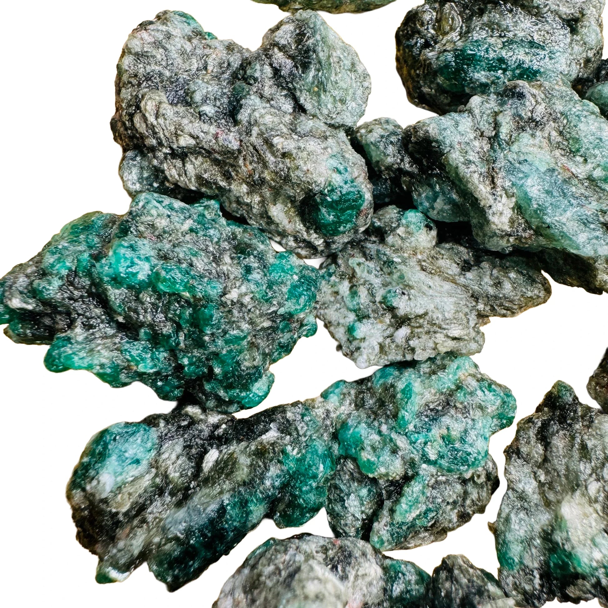 Profile view of Emerald raw stone, carried for Love and Abundance, hand-selected from Midlands Province, Zimbabwe.