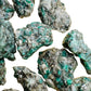 Overhead angle of Emerald raw stone, showing natural form.