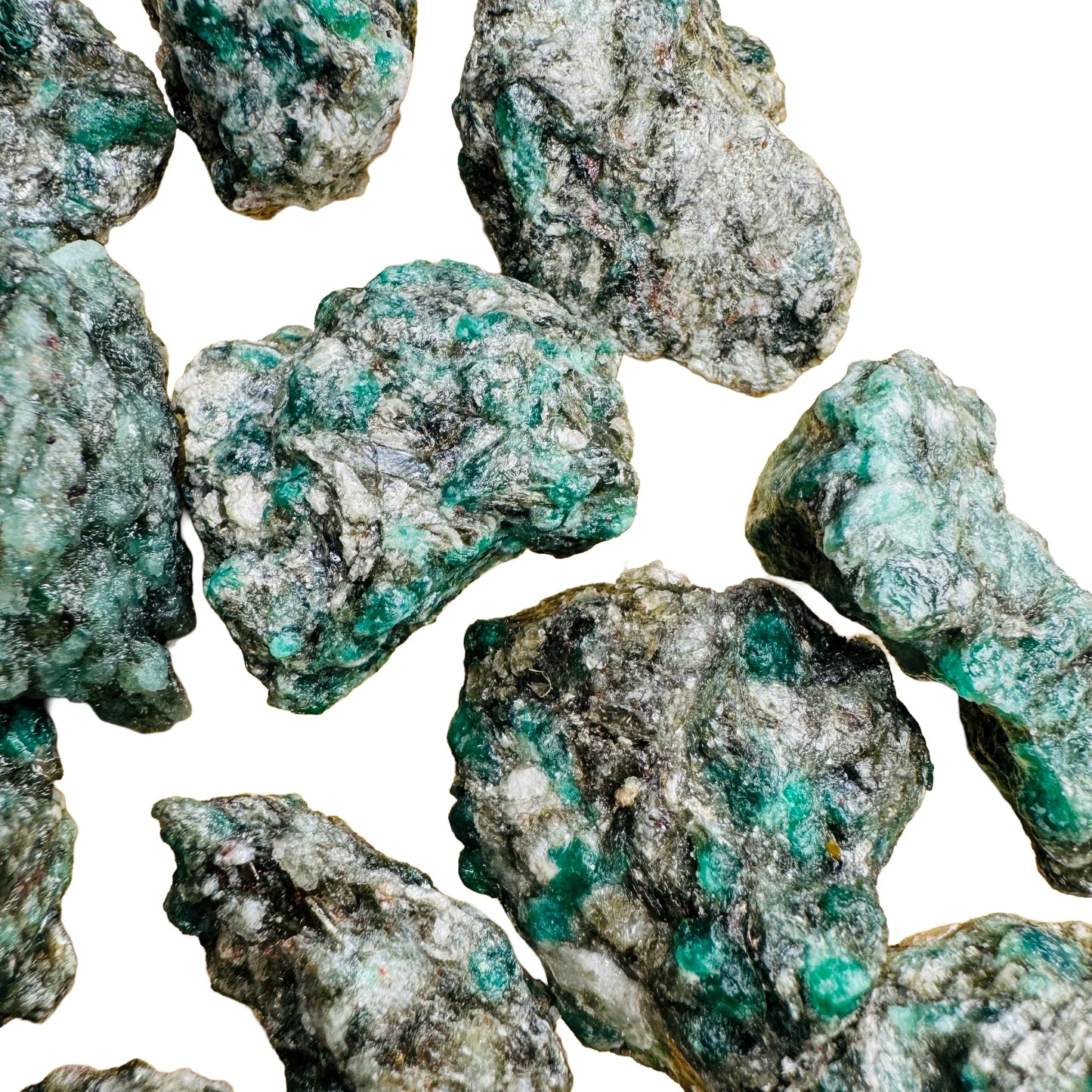 Overhead angle of Emerald raw stone, showing natural form.