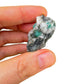Detail shot of Grade AA Emerald raw under natural light