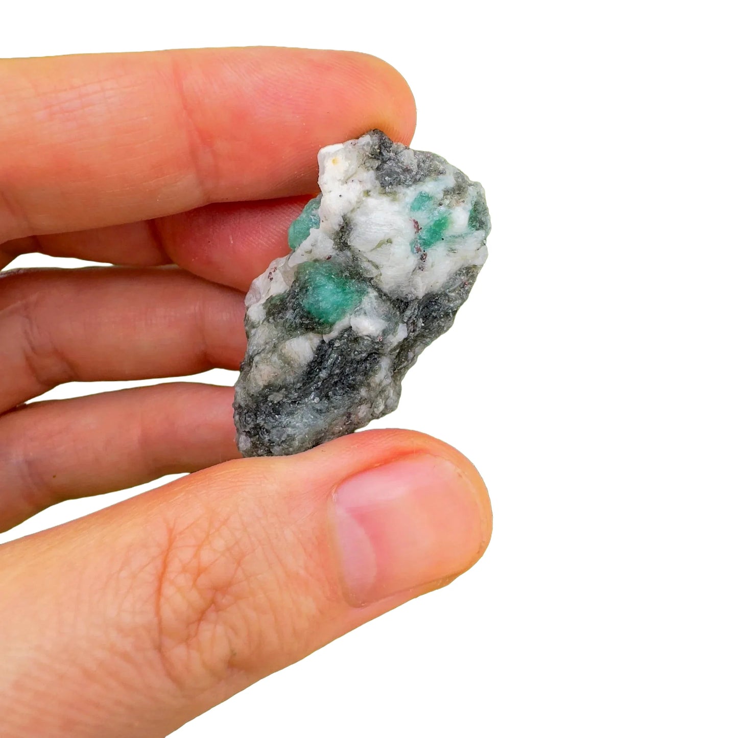 Detail shot of Grade AA Emerald raw under natural light
