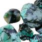 Palm-scale view of one Emerald raw stone for scale, from Brazil.