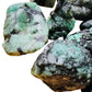 Lifestyle context of Emerald raw crystal, captured in soft, even lighting.