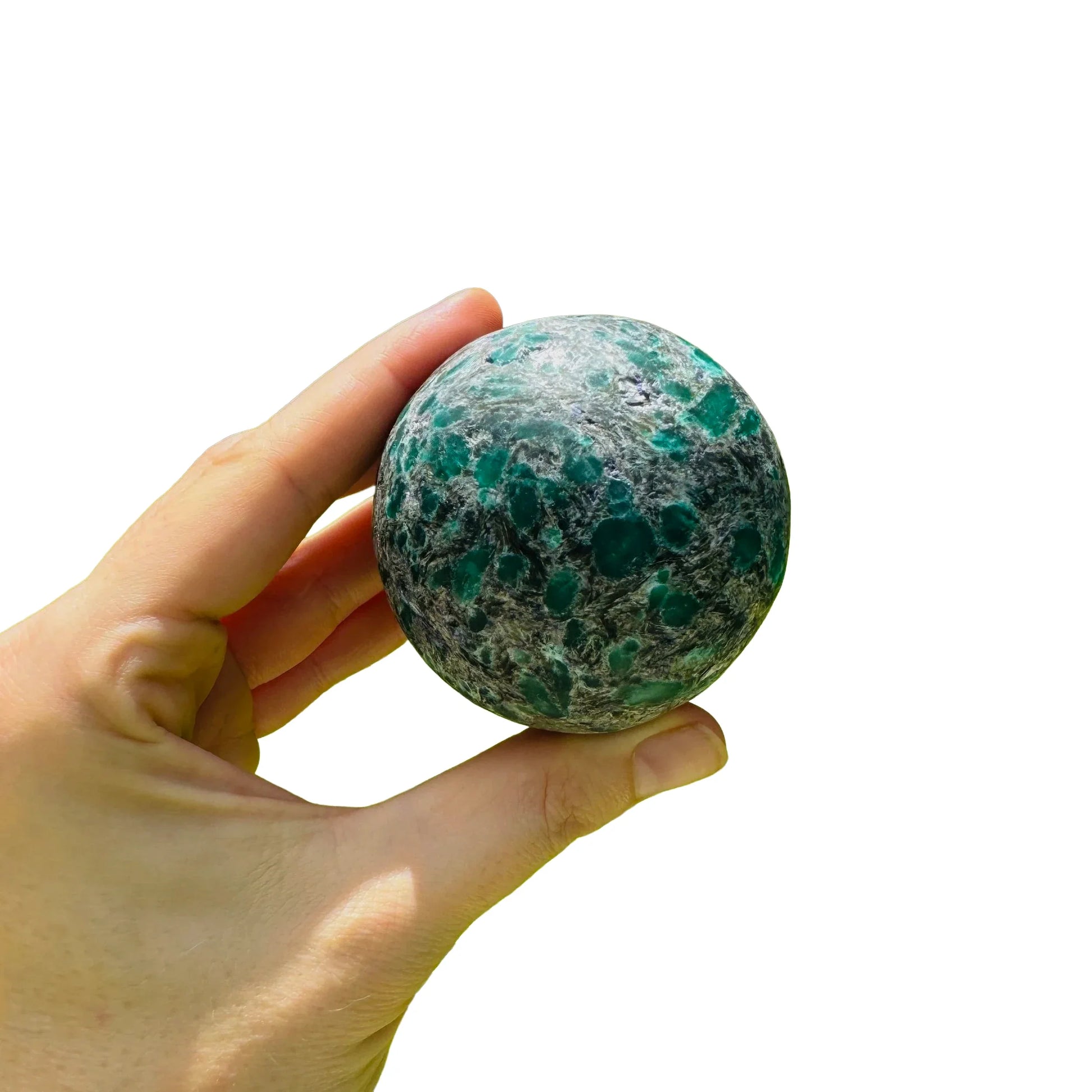 Grain detail of Emerald polished sphere, showing translucent edges.