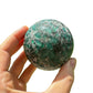 Top view of Emerald polished sphere, Zimbabwe-sourced.