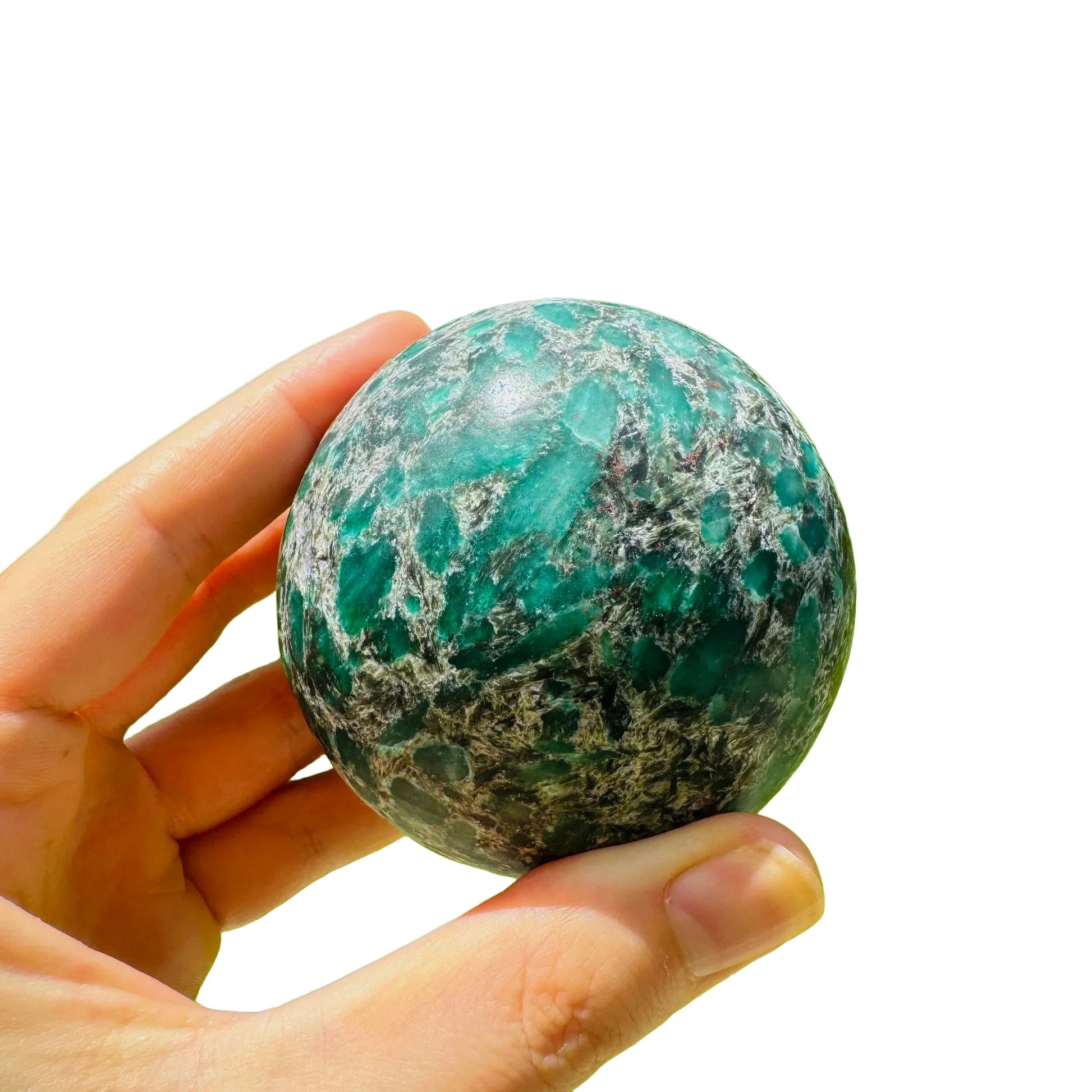 Underside view of Emerald polished sphere, showing subtle veining, from Zimbabwe.