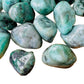 Side perspective of Emerald tumbled stone, sourced from Brazil, showing soft luster.