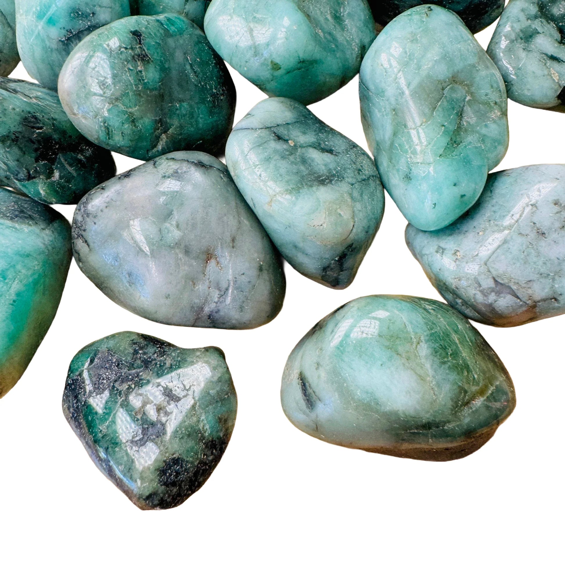 Side perspective of Emerald tumbled stone, sourced from Brazil, showing soft luster.