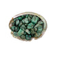 Detail shot showing Emerald tumbled stone, associated with Love.