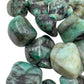 Reverse side of Emerald tumbled stone, sourced from Brazil, associated with Love.