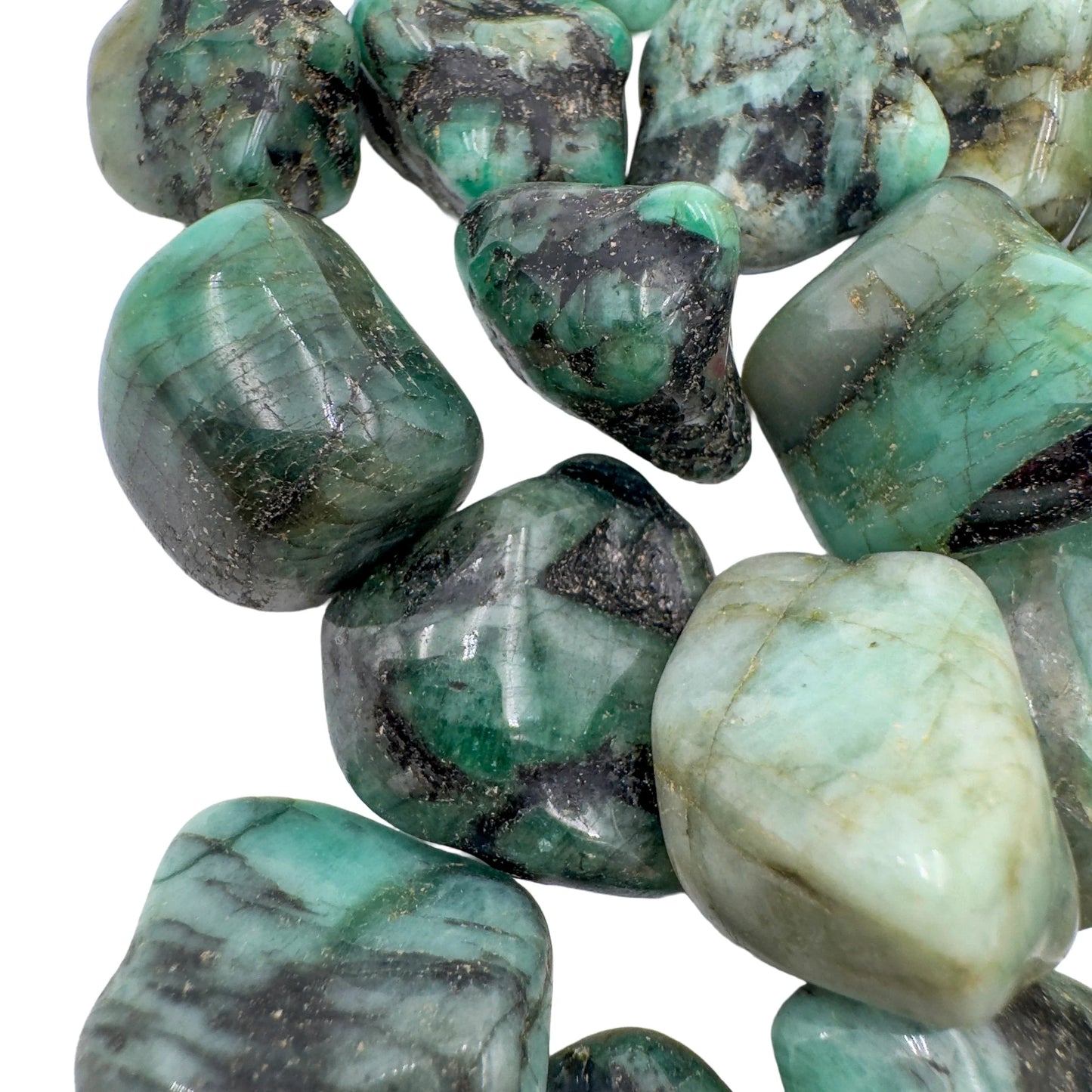 Reverse side of Emerald tumbled stone, sourced from Brazil, associated with Love.