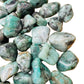 Full profile of Grade AA Emerald tumbled stone ready to ship from Beyond Bohemian