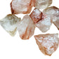 Side perspective of Grade AA Fire Quartz raw stone, showing natural variation, worked with for Grounding and Confidence.