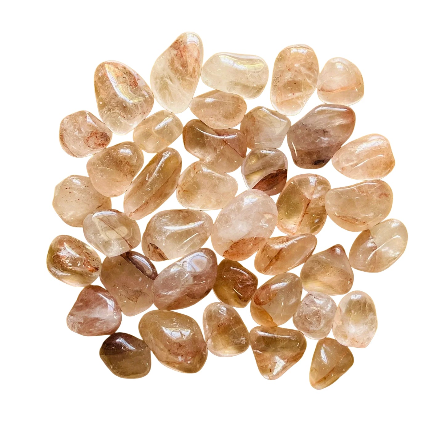 Resting display of Fire Quartz tumbled stone, from Alaotra-Mangoro, Madagascar, shown for shape and scale.