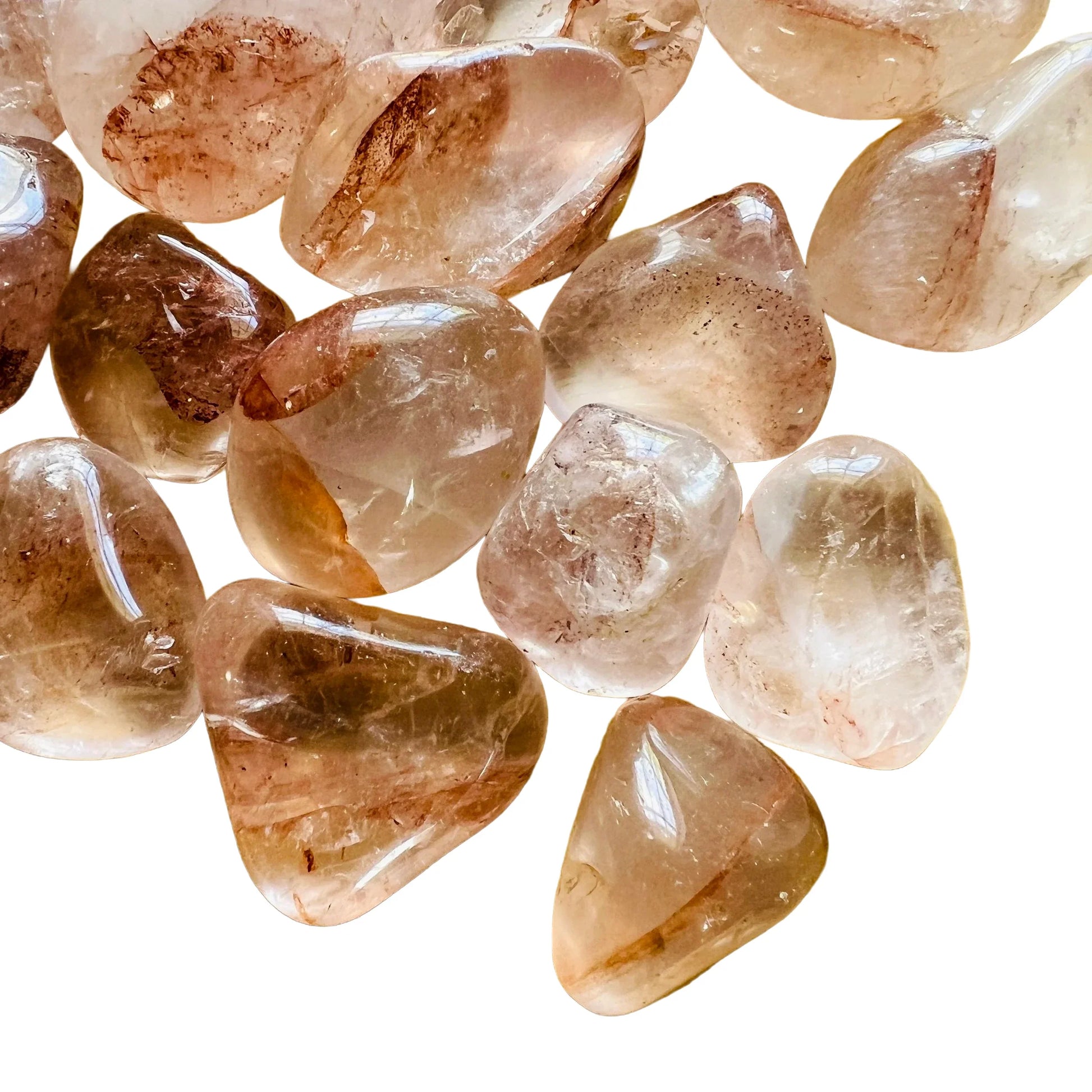 Detail shot of Grade AA Fire Quartz tumbled stone under natural light