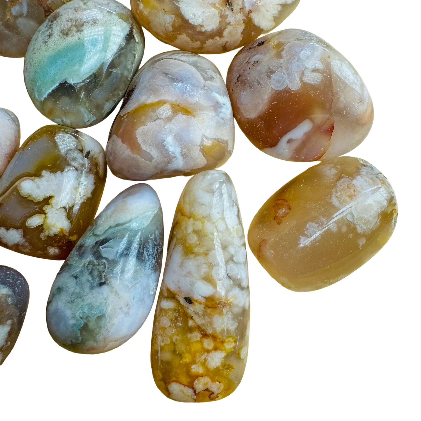 Close detail of Flower Agate tumbled stone, kept near for Love and Emotional Healing, from Madagascar.