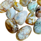 Side perspective of Flower Agate tumbled stone, carried for Love, hand-selected from Analamanga, Madagascar.