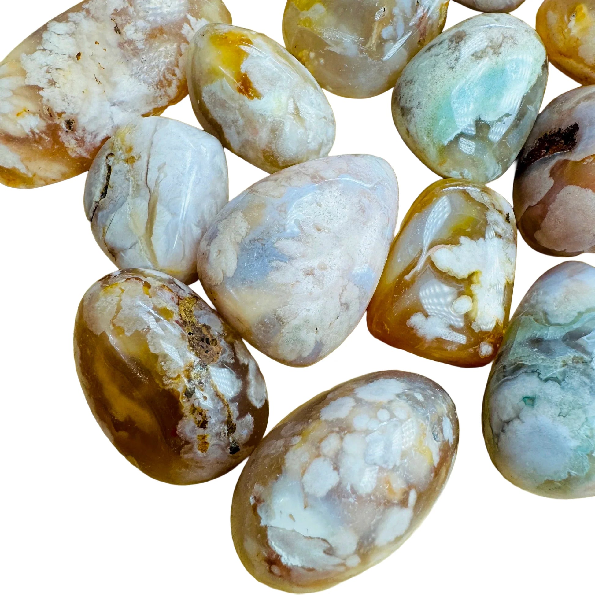 Side perspective of Flower Agate tumbled stone, carried for Love, hand-selected from Analamanga, Madagascar.