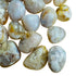 Up-close view of Flower Agate tumbled stone, showing characteristic patterning.