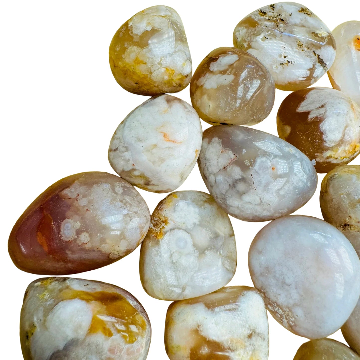 Top-down shot of Flower Agate tumbled stone, carried for Love.