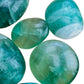 Back view of purple Fluorite palm stone, sourced from Madagascar.