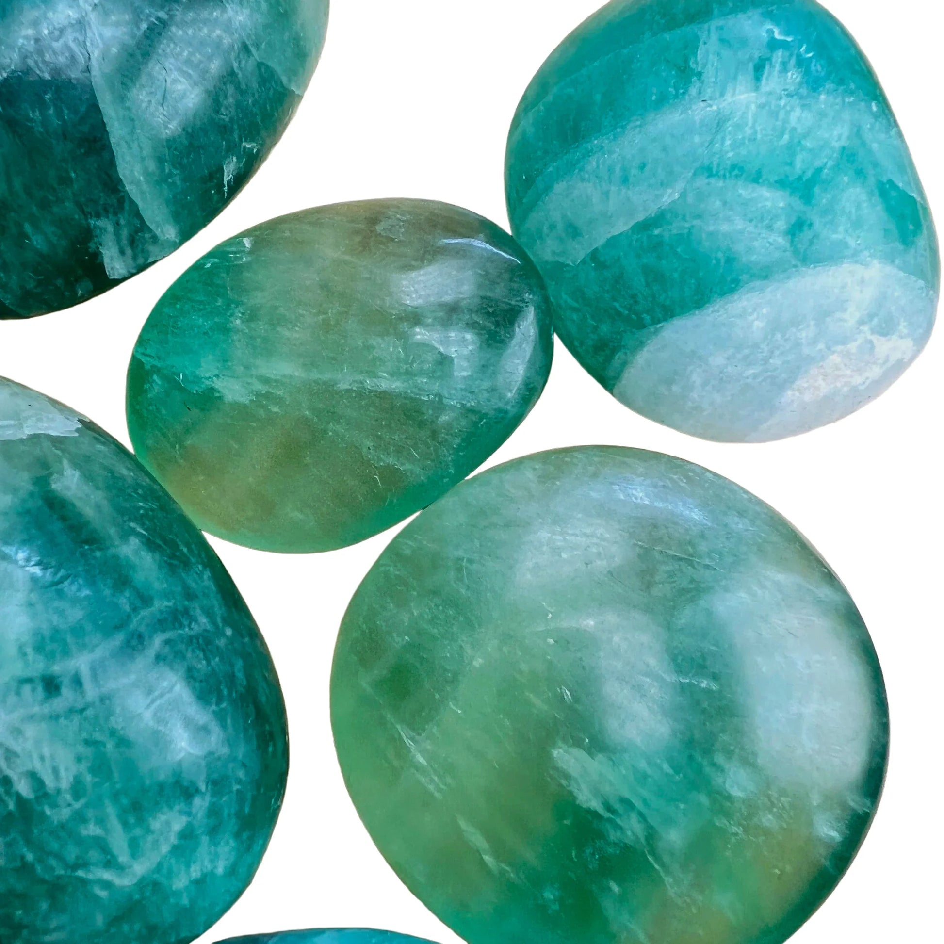 Back view of purple Fluorite palm stone, sourced from Madagascar.