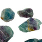 Back view of Fluorite raw stone, showing natural texture.