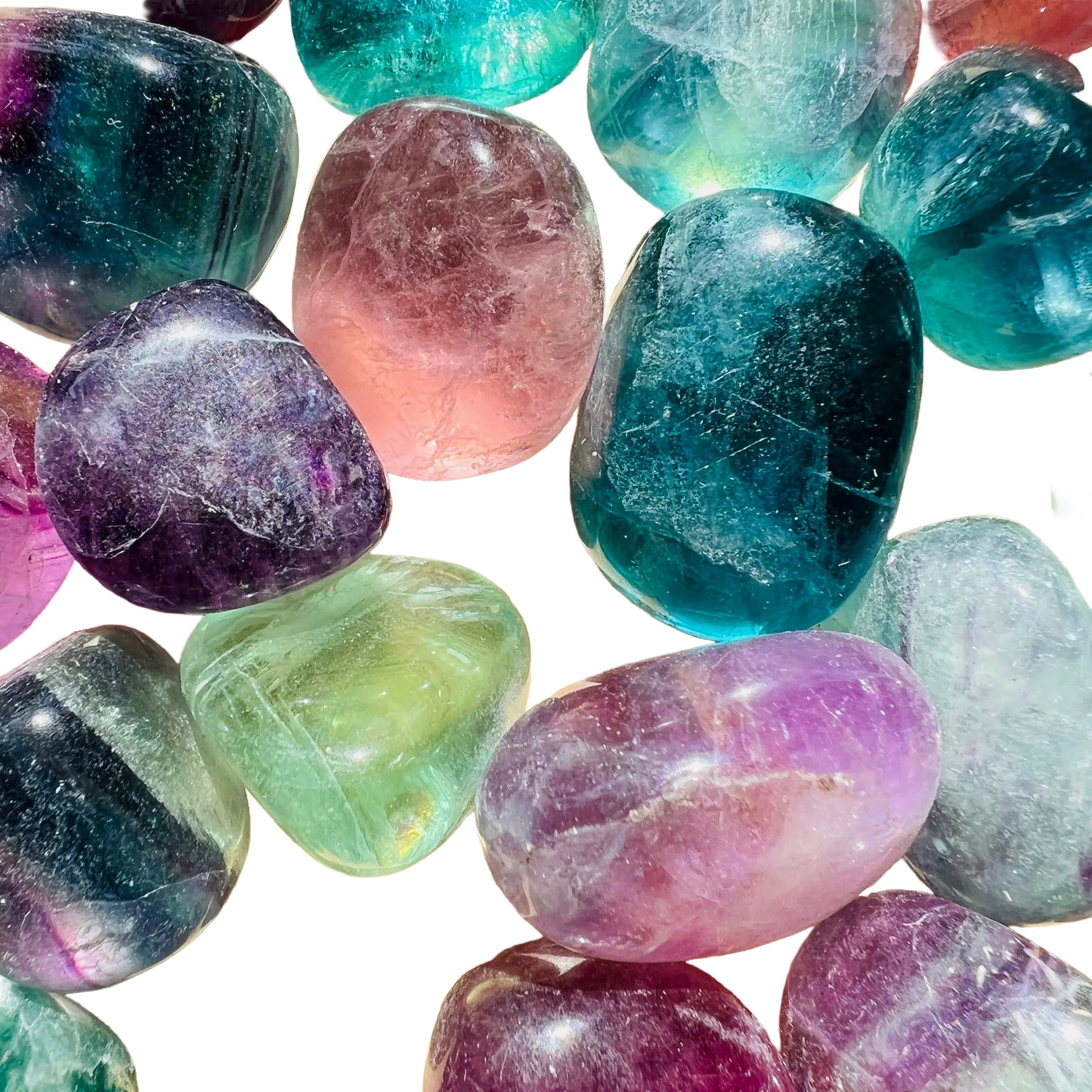Grain detail of Grade AA Fluorite tumbled stone, often kept for Focus, showing characteristic color.