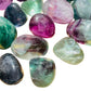 Soft-light view of Fluorite tumbled stone, from Jiangxi, China, with surface texture in view.